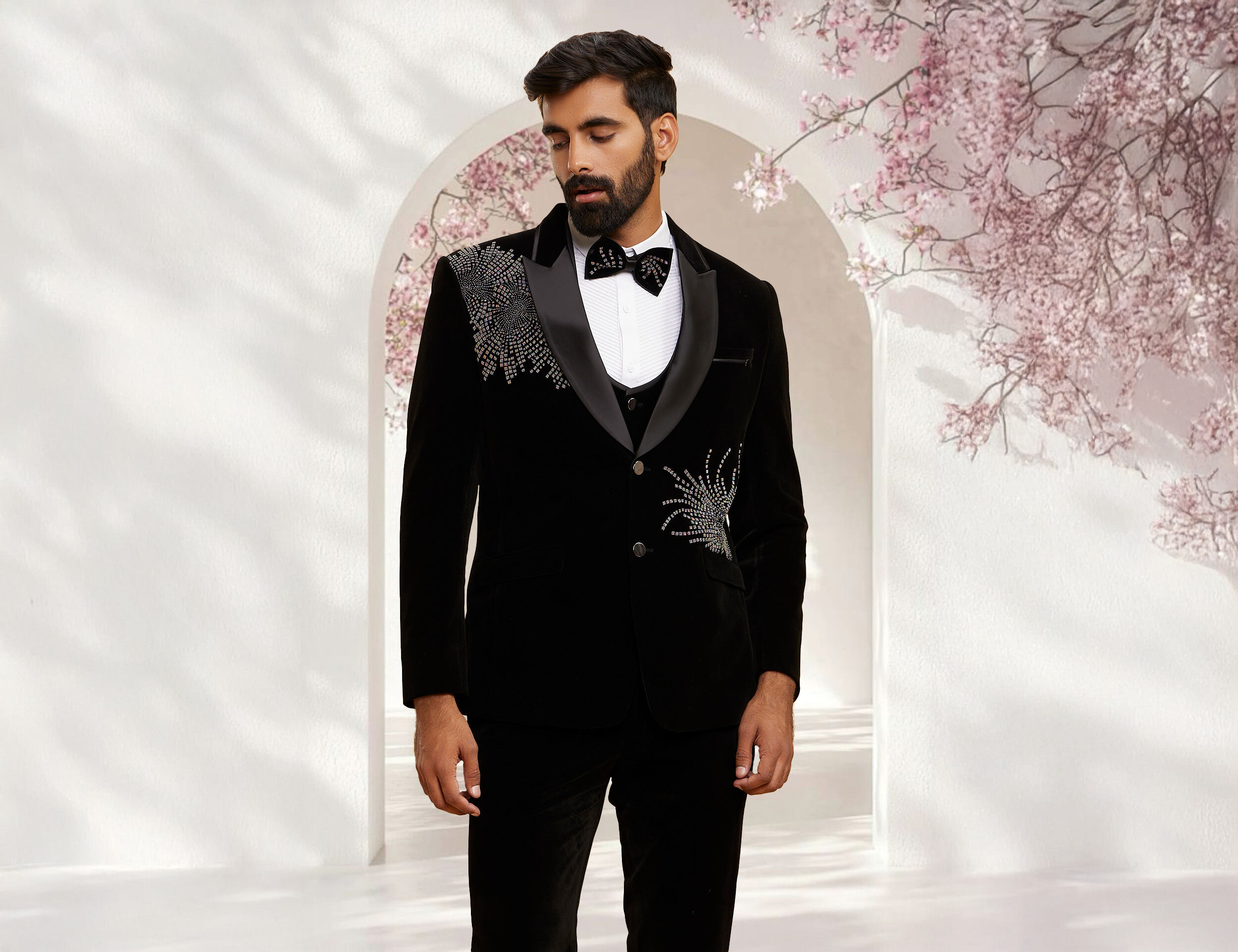 Elegant black charisma suit, perfect for a sharp and sophisticated reception tuxedo look